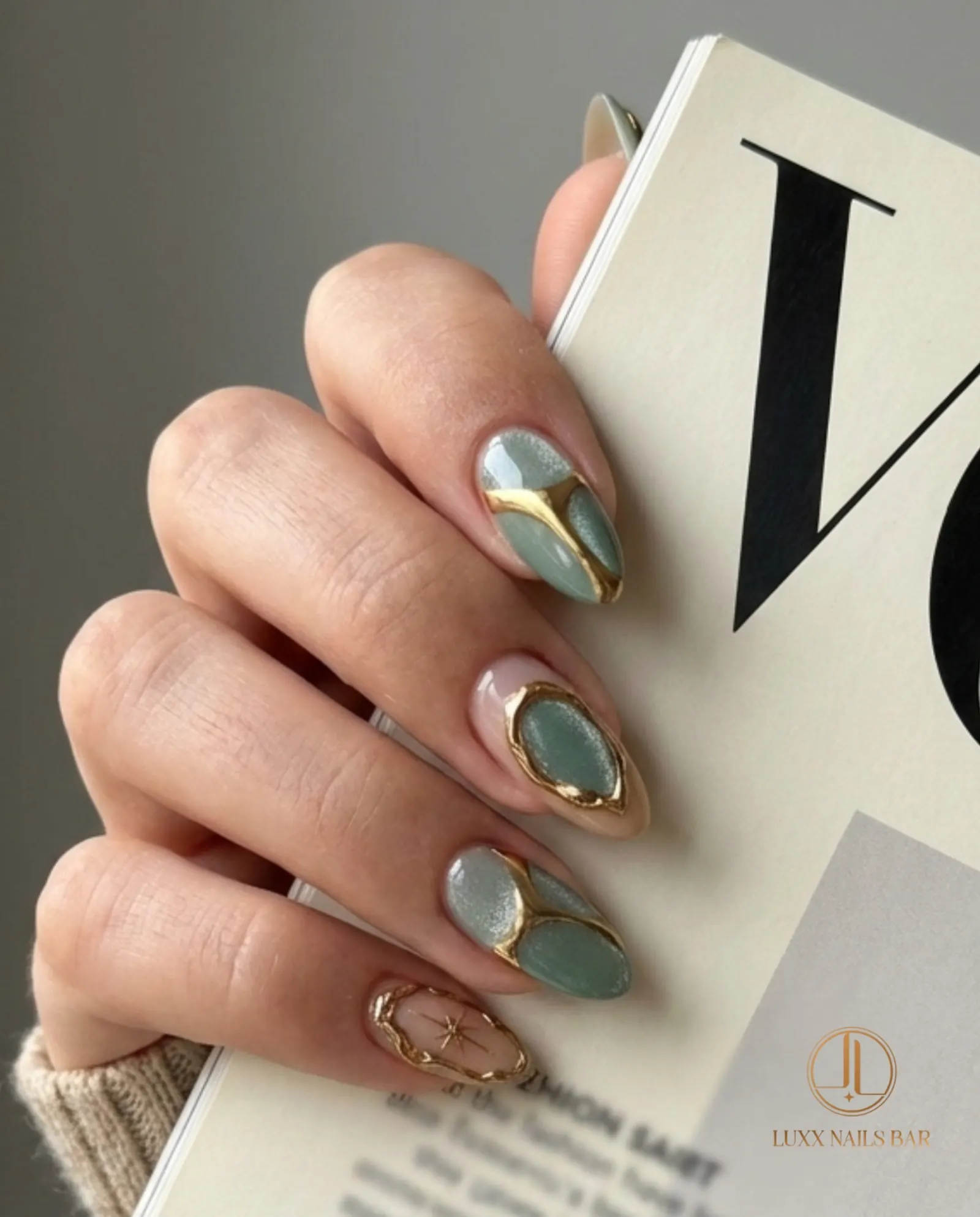 Editorial nail art at Luxx Nail Bar Georgetown TX 78633 — sage green and gold detailing